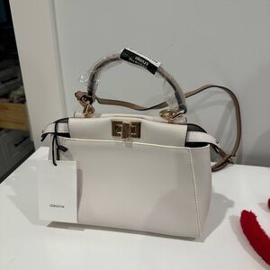 No-authentic handbag , new with tag